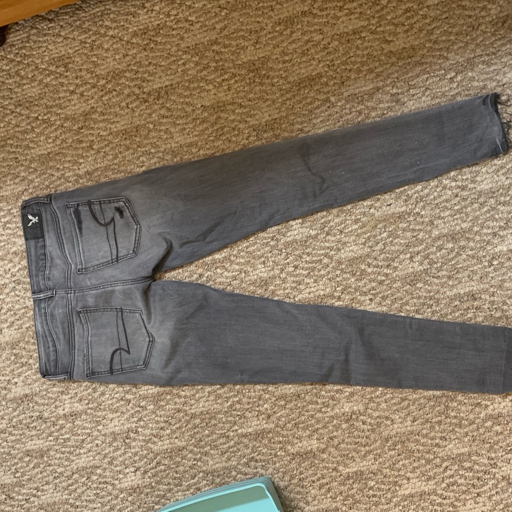 Faded/distressed black American eagle jegging